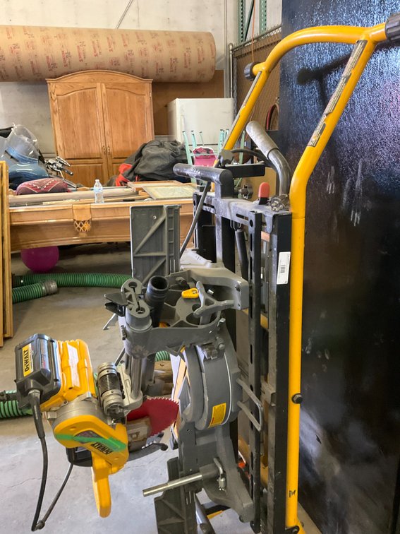 Dewalt Sliding Flex Volt 12" Sliding Compound Miter Saw - Model: DHS790, Saw Runs on Dewalt Flex Volt Corded Power Supply, Mounted on Dewalt Portable Rolling Stand