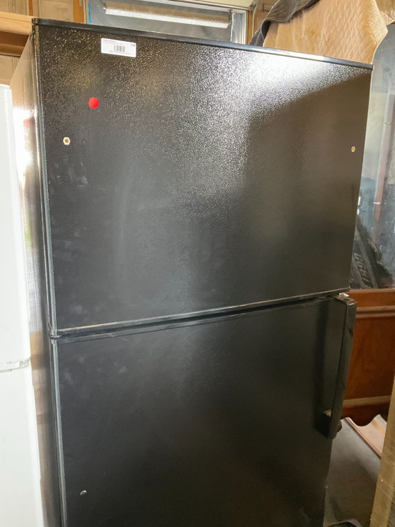 GE Refrigerator - Model: GIE21GTHGBB, 21.1 Cubic Feet, Right Door Swing, Top Freezer, Black, Unused, 33"W x 66"H x 29"D