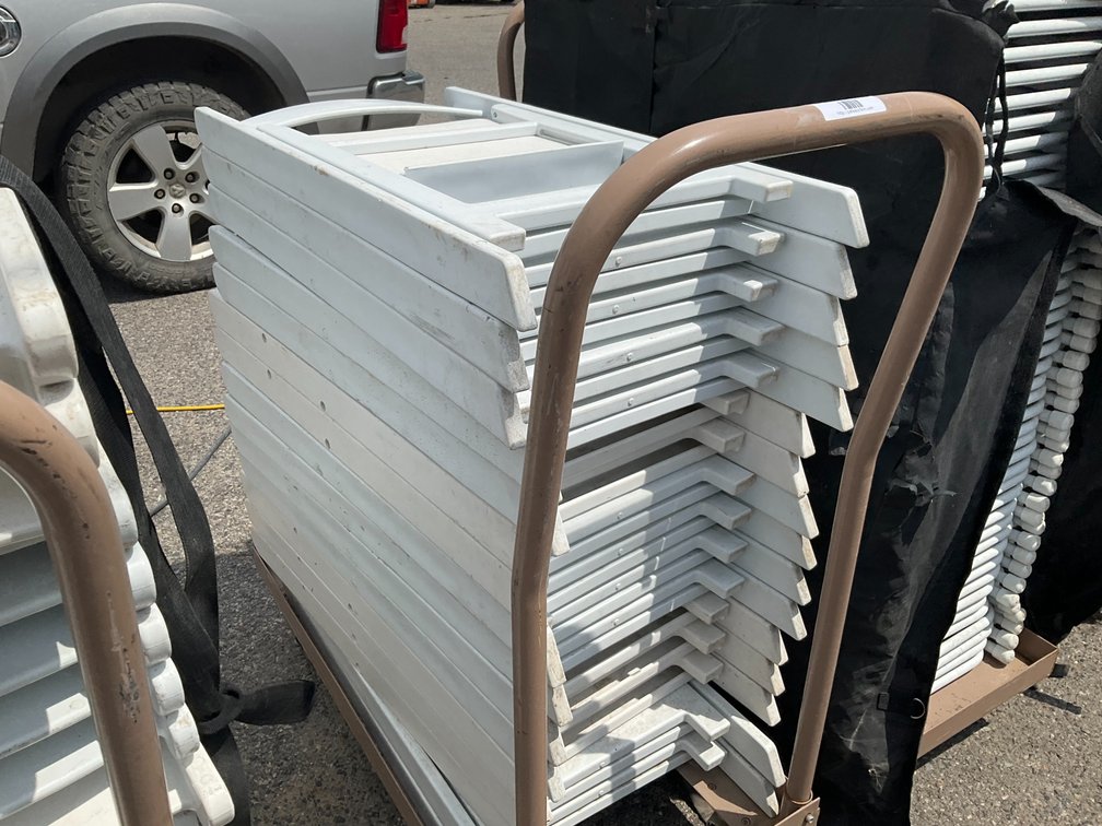 Rolling Cart with Approximately (16) White Plastic Padded Folding Chairs