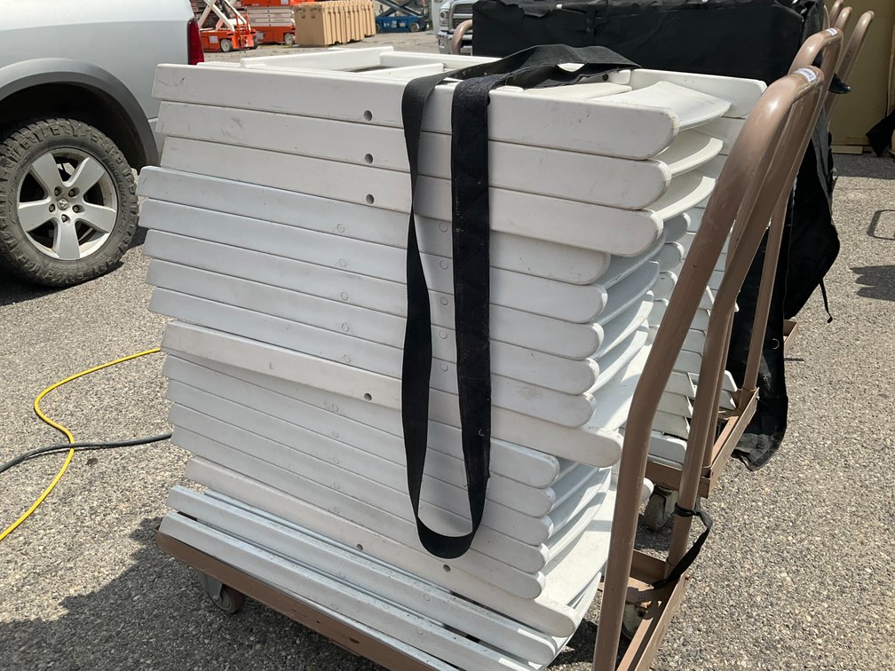 Rolling Cart with Approximately (18) White Plastic Padded Folding Chairs