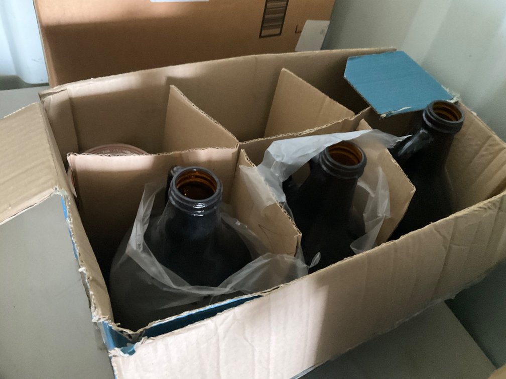 (3) Glass Growlers, Bert and Ernie's Bar Coasters and Big Sky Brewing Bar Coasters