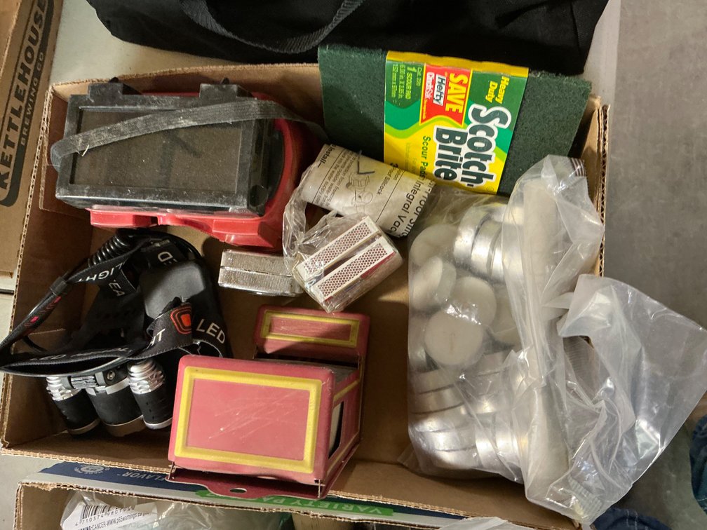 LED Headlamp (No Charger), Tea Light Candles, Welding Goggles, Matches and More