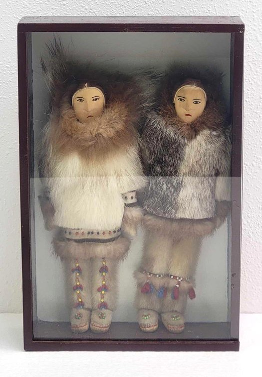 Two Yup'ik Dolls in Display Case