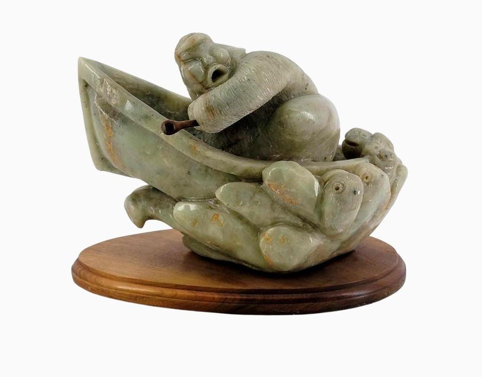 Inuit Stone Carving of Fleeing Hunter