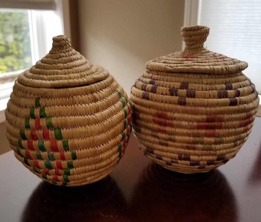 Two vintage native grass woven baskets