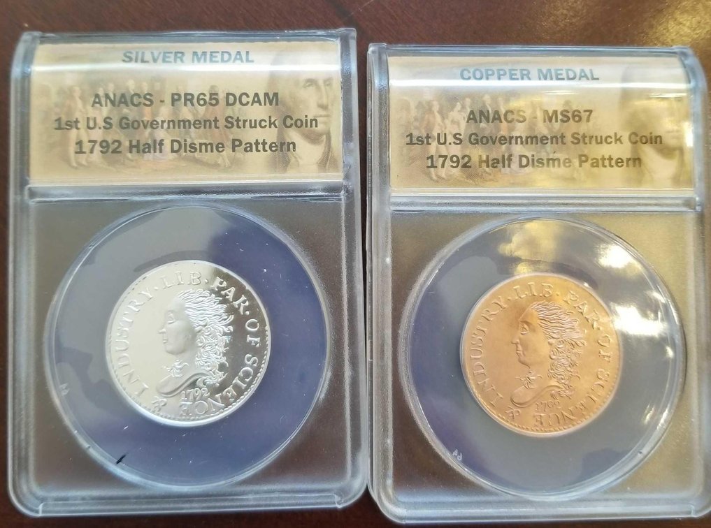 Silver and copper medals of first struck American half Disme 1792.