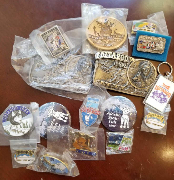 Lot of Iditarod collectibles, state fair pins