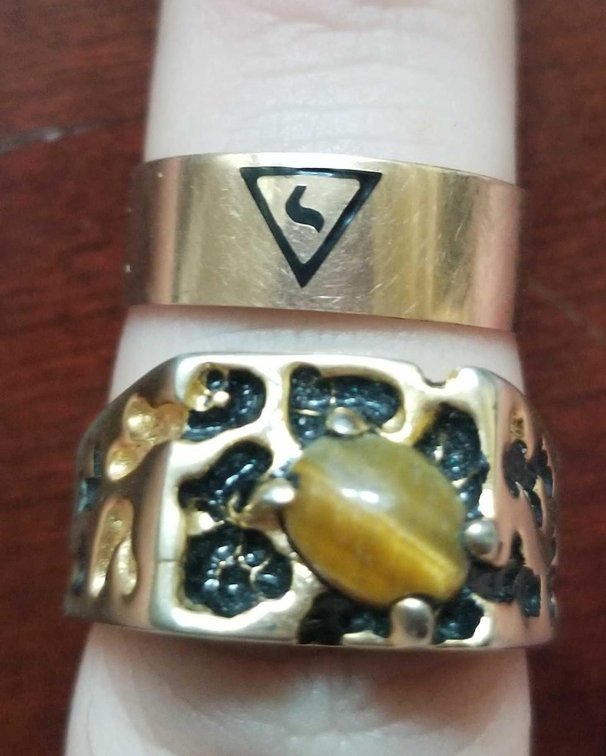 Two mens rings, one 10k solid gold