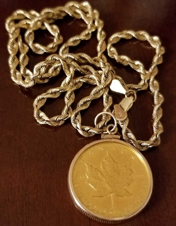 Fine 1/2 troy ounce .9999 Candian gold coin pendant with heavy 14K gold chain 