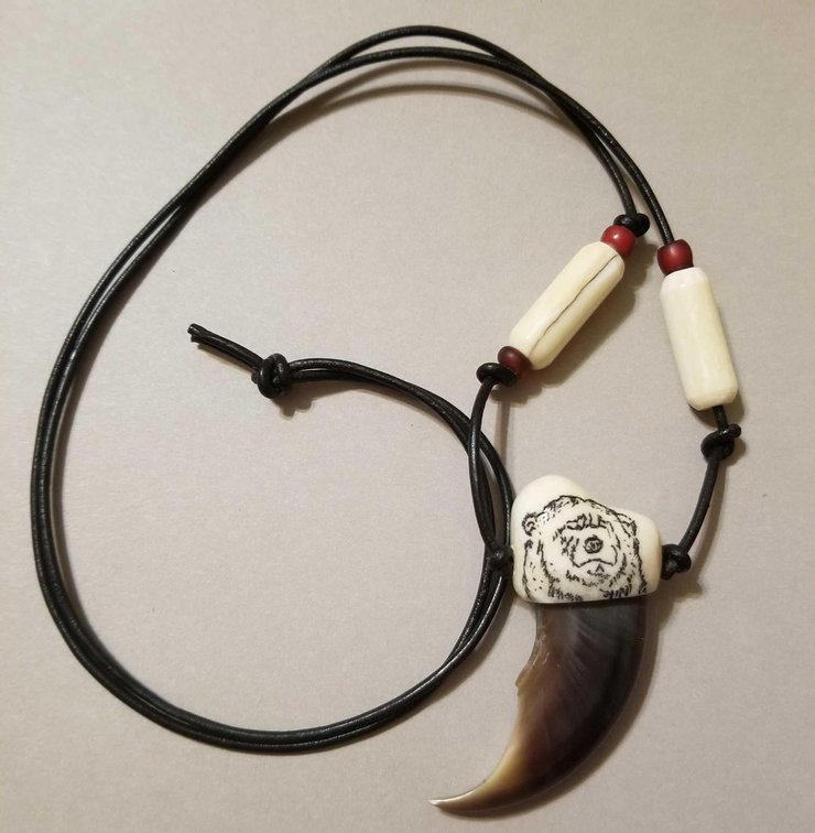 Bear claw pendant necklace with scrimshawed bear end cap and ivory beads
