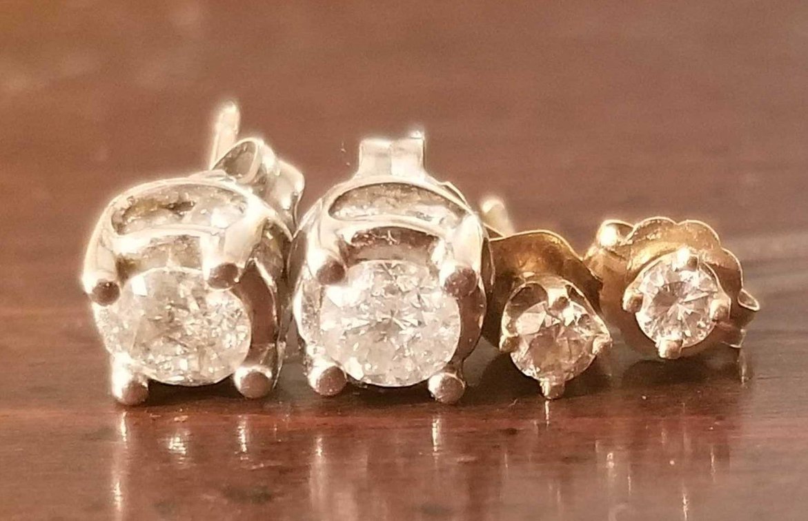 Two pairs of 14K gold diamond earrings