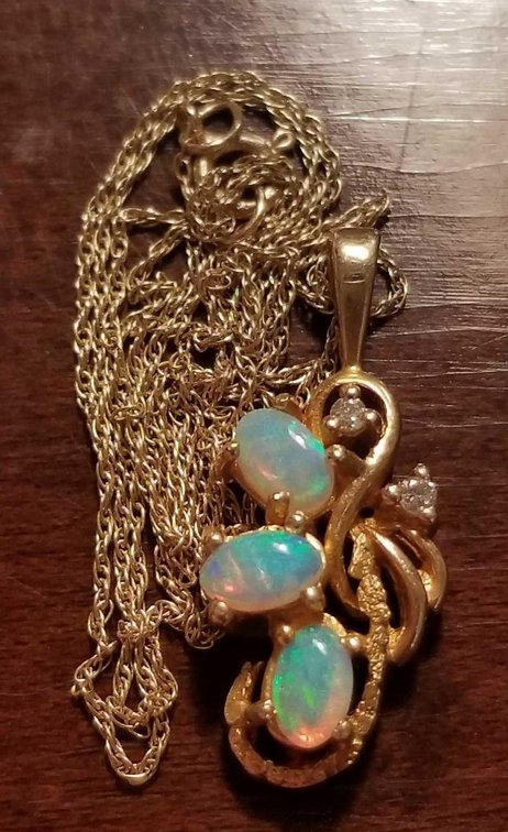 Opal and diamond 14k gold pendant on 14k chain 