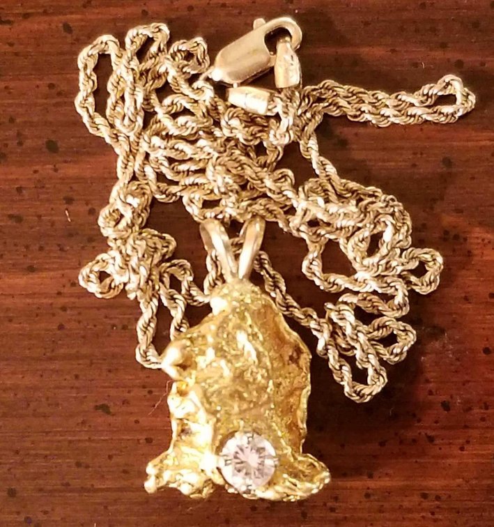 Very nice gold nugget and diamond pendant on 14K gold chain 