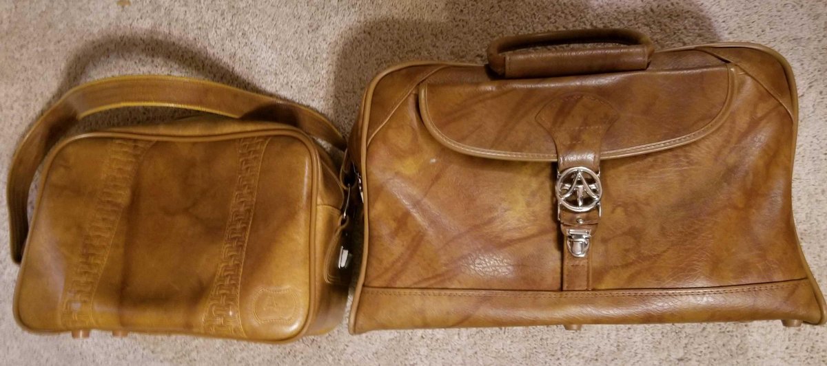 Two vintage American Tourister quality synthetic leather bags 