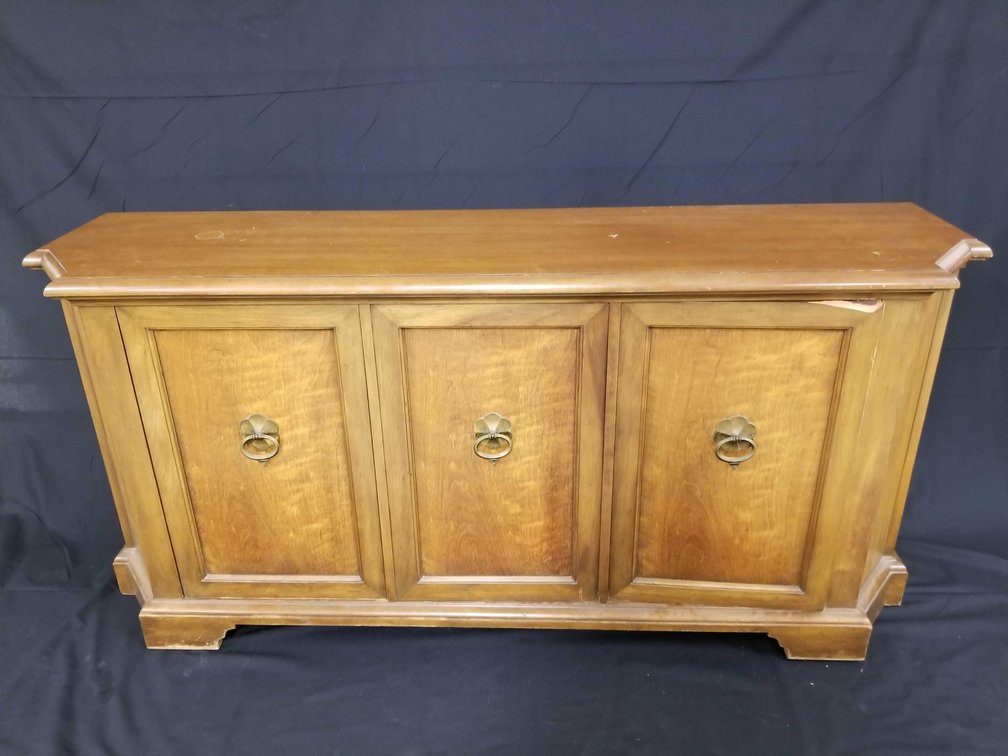 Solid wood wood hideaway dresser by Baker Furniture 