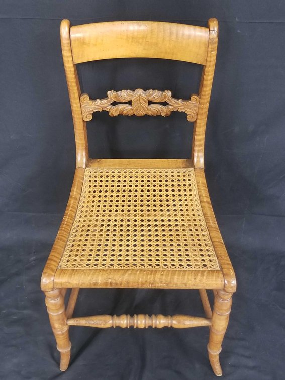 Childrens carved wood and woven cane seat chair 
