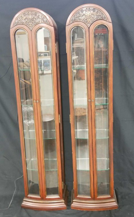 Two illuminated curio cabinets