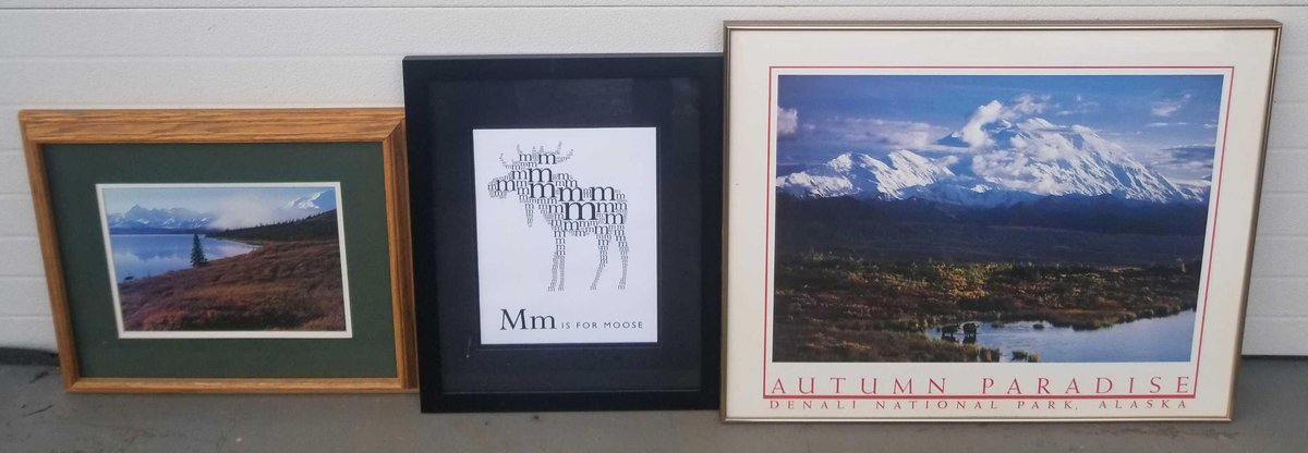 Three pieces of generic Alaskan artwork