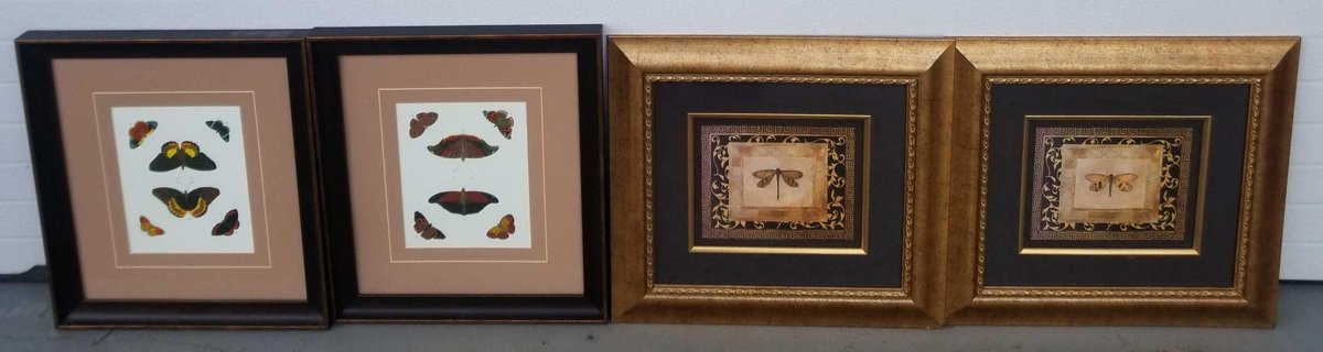 Four pieces of framed butterfly themed artwork