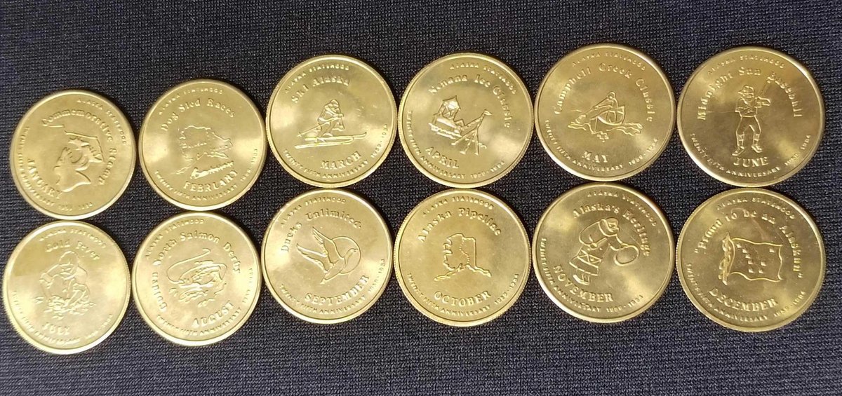 Lot of 12 1984 Fairbanks bus tokens 