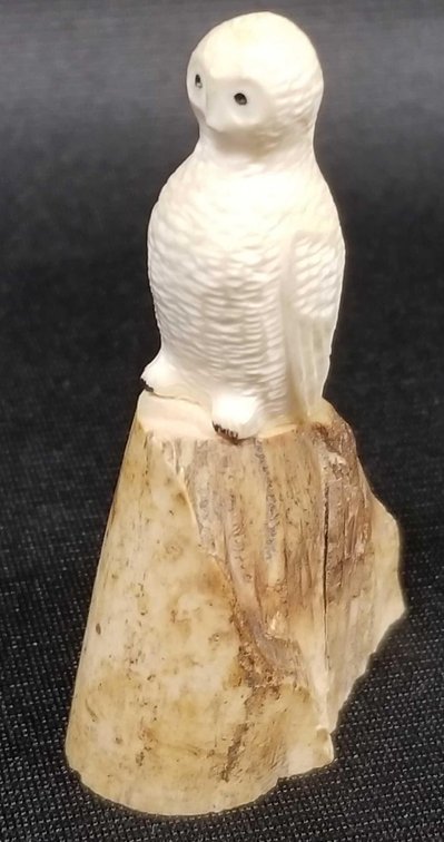 Carved ivory owl by Siberian Yupik artist Joseph Iyahuk 