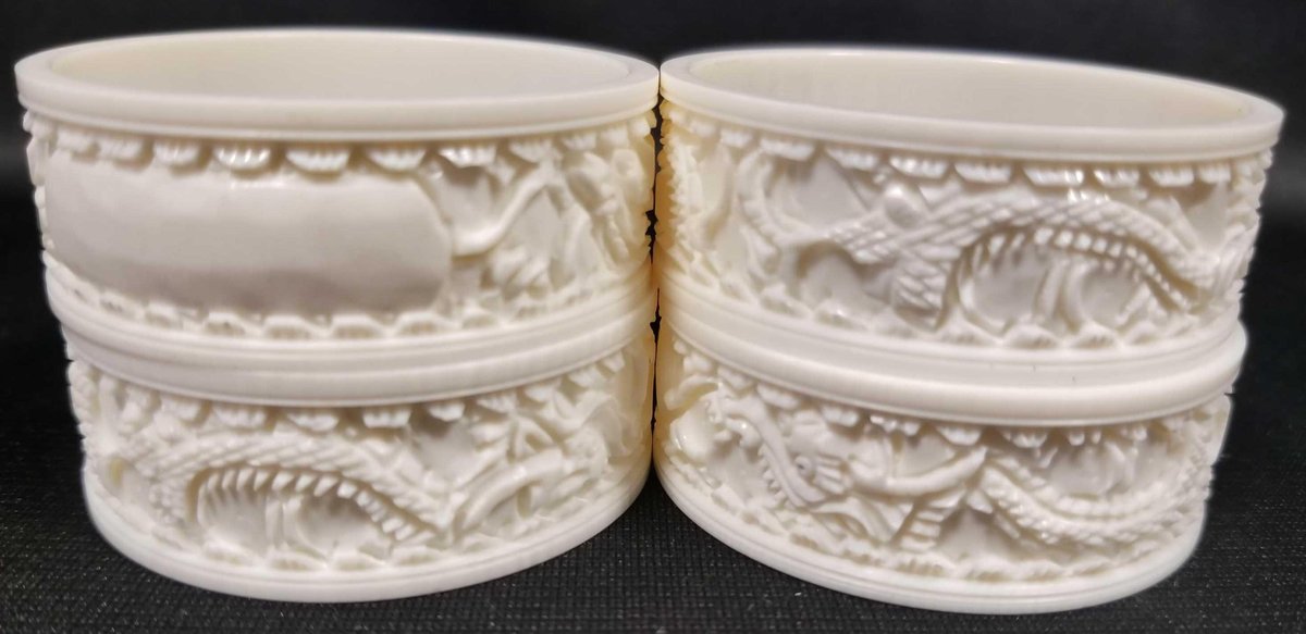 Four vintage carved bone napkin rings 
