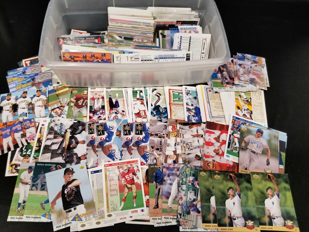 Large box lot of unsorted sports cards 