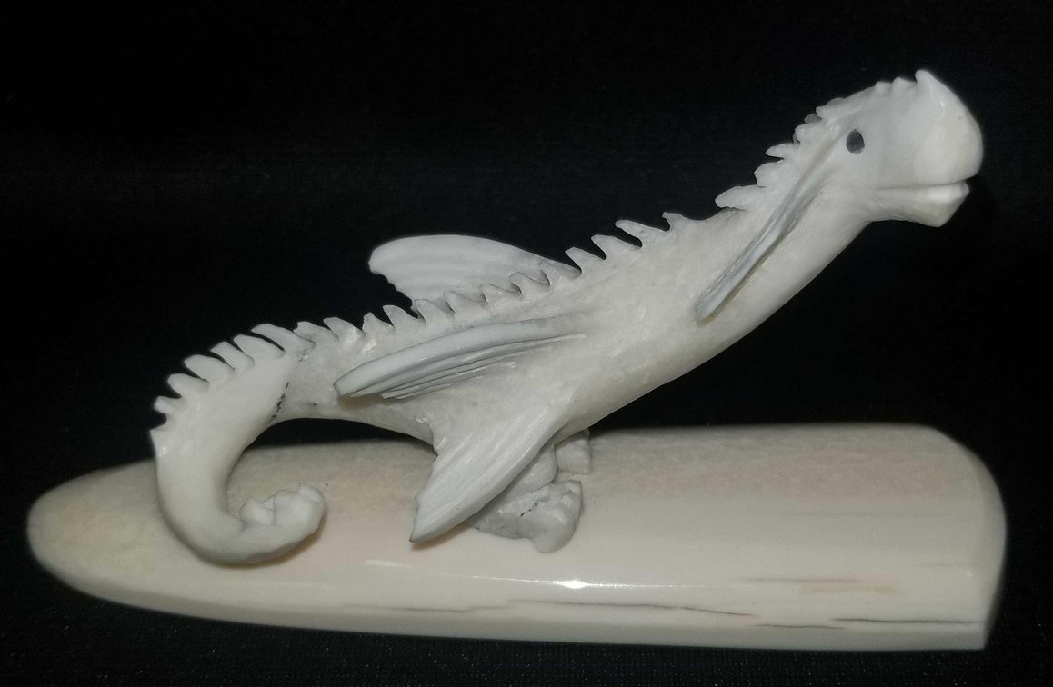 Carved and polished ivory dragon 