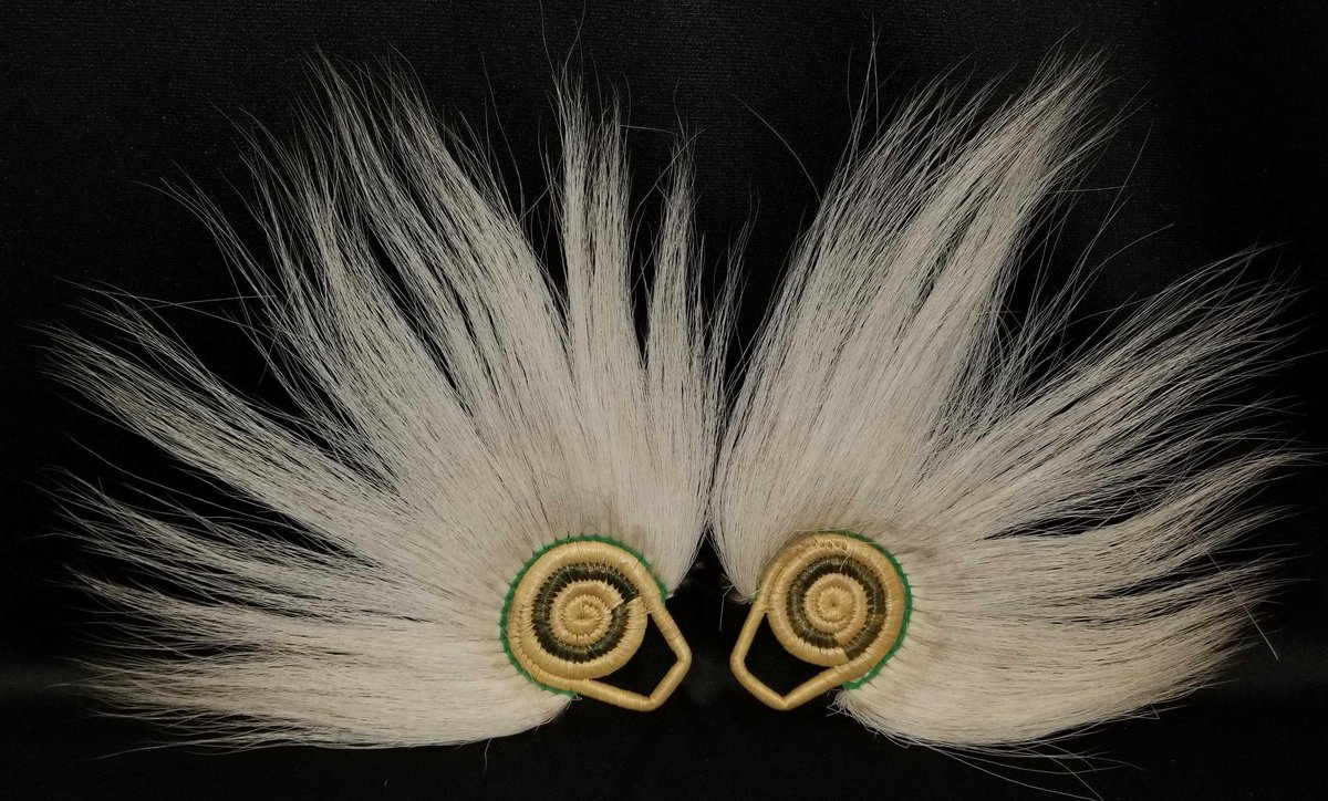 Two Yupik dance fans 
