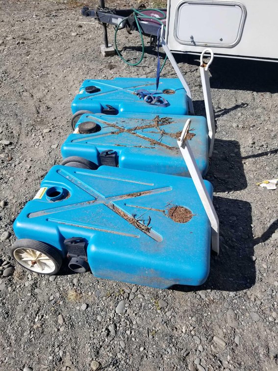 Three four wheeled water transport systems 