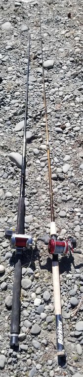 Two premium trolling/bait casting rods and reels 