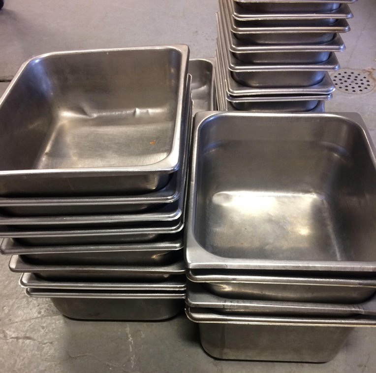 Large lot of over 30 metal serving trays