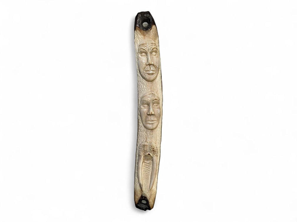 Carved Fossil Ivory Totem by Judy Pelowook