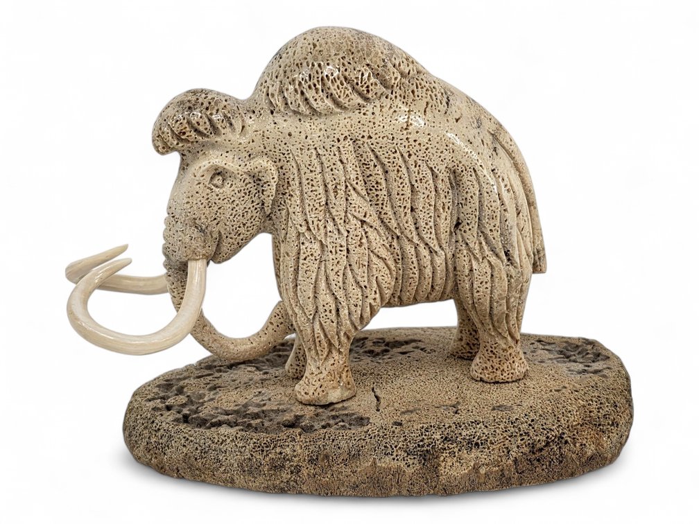 A Mammoth Figure Carved from Fossilized Bone