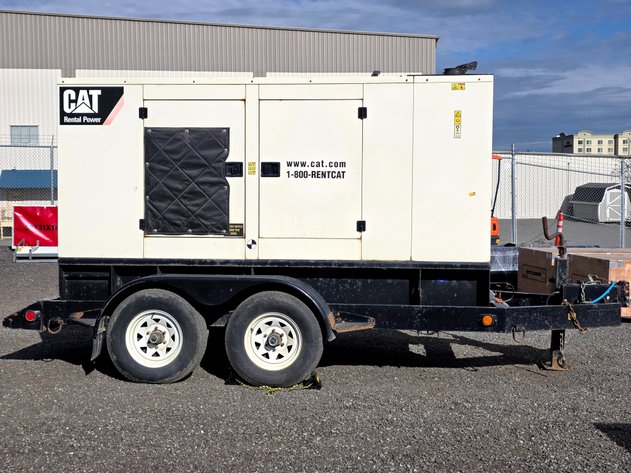 2010 Caterpillar XQ80-4 80 kW Standby Diesel Generator — Tandem-Axle Trailer