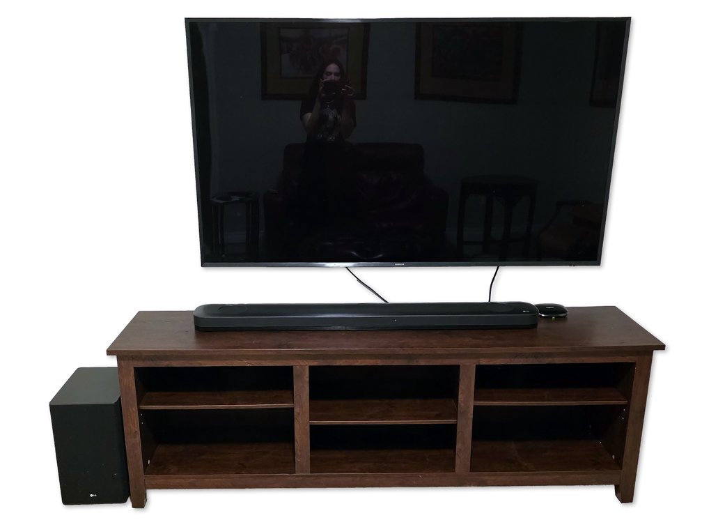 Samsung TV, One Connect Box, LG Soundbar and Subwoofer with Media Stand