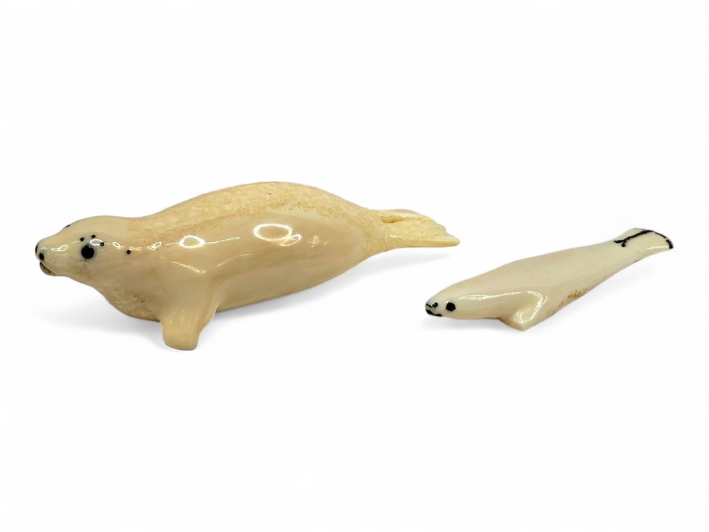 J. Koyuk & F. Pikonganna Walrus Ivory Seal Carvings