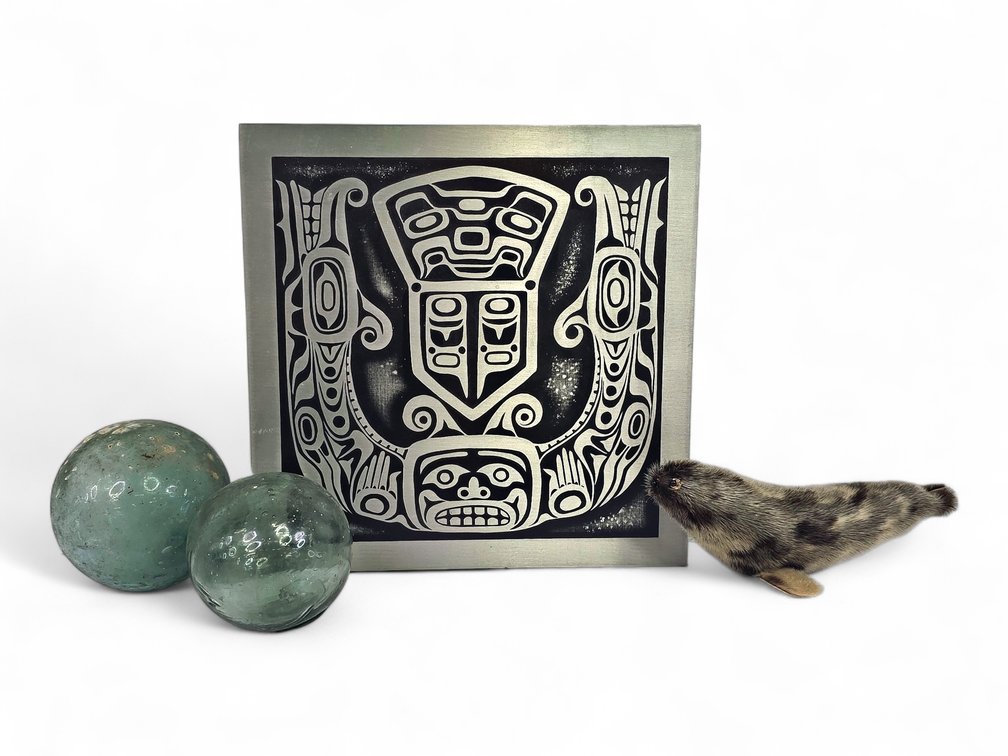 “Sisiutl and Copper” Northwest Coast Plaque, Glass Fishing Floats & Fur Seal Toy