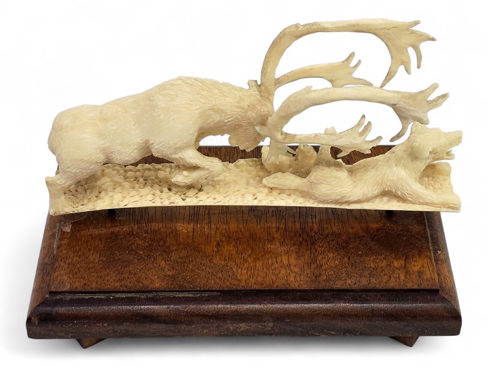 D. Noel Smith Walrus Ivory Caribou & Wolf Sculpture on Wood Base
