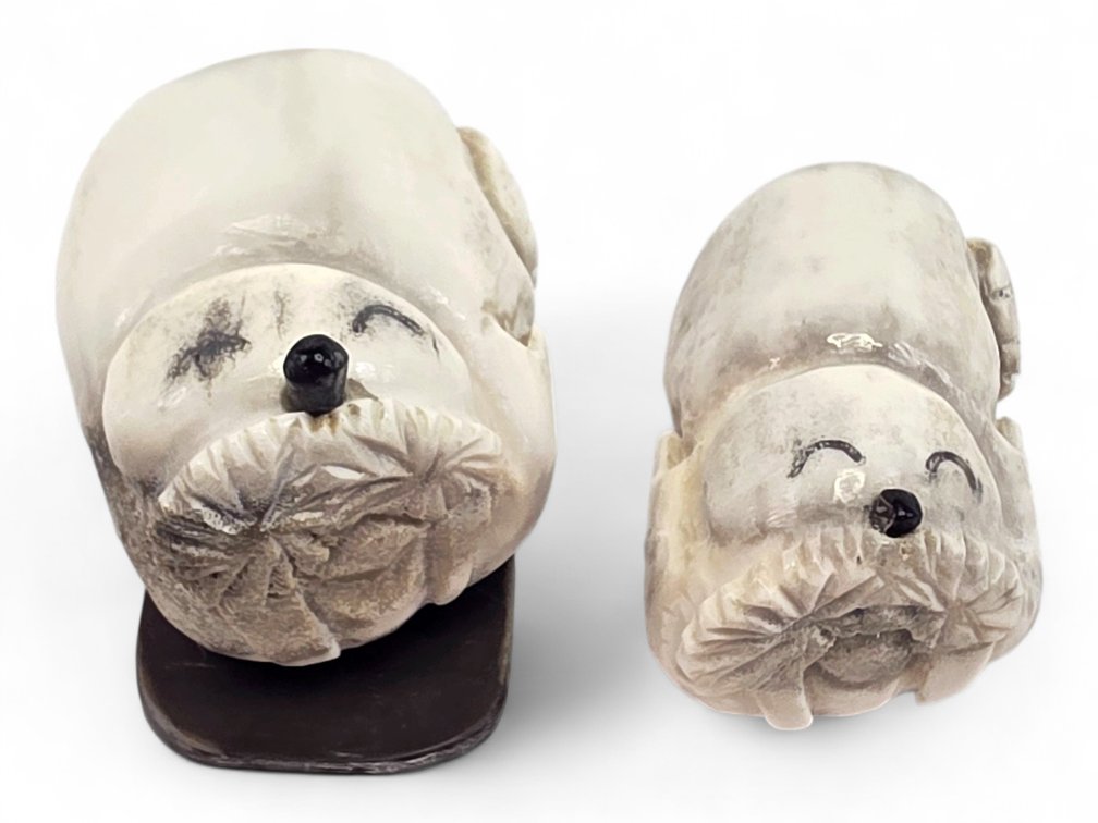 Two Antler Happy Walrus Carvings, One on Baleen Base Initialed GD