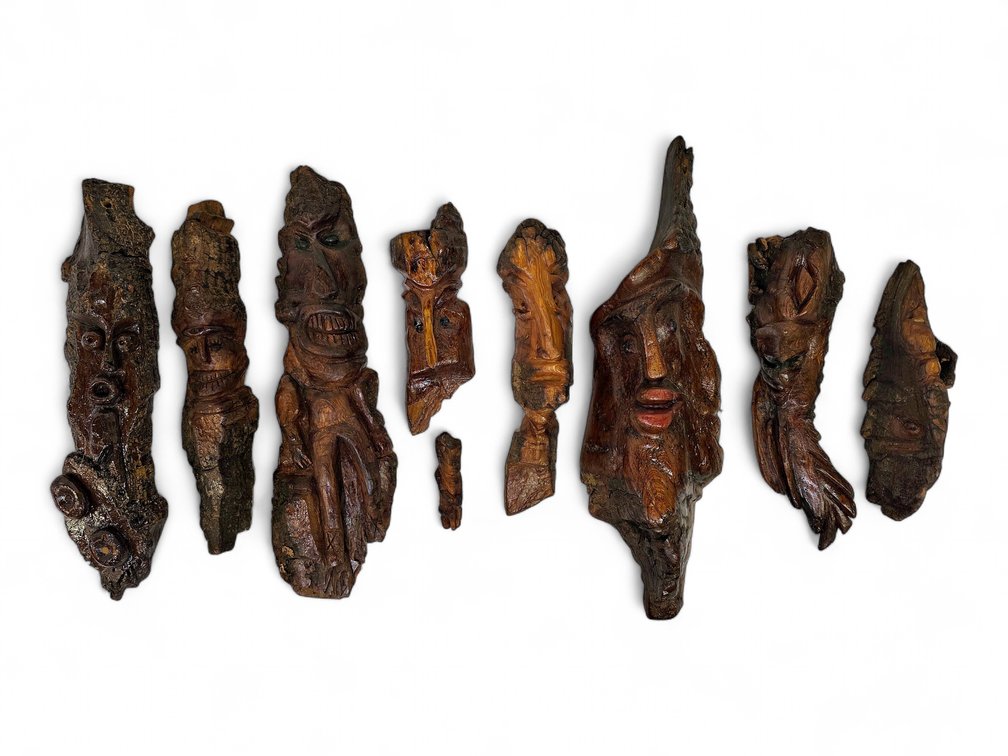 Nine Carved Wood & Bark Faces, Eight Signed Ricky Rismoen