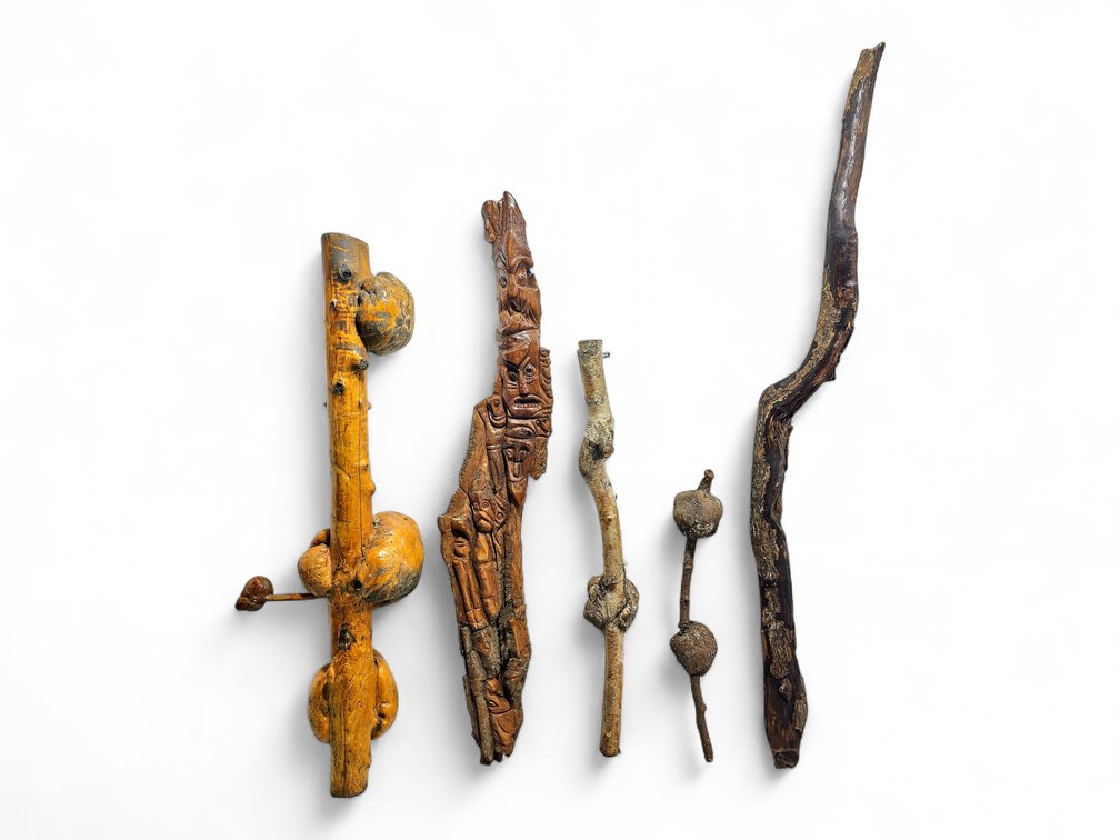Carved Wood Faces with Three Burled Branches & Large Dark Branch