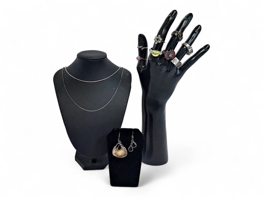 Sterling Silver Jewelry: Eight Rings, Two Chains & Two Pairs of Earrings, 48.40g Gross
