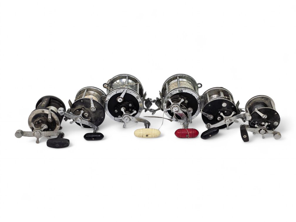 Six Penn Fishing Reels — Two 309s, Two Senator 6/0s, 321LH & 209