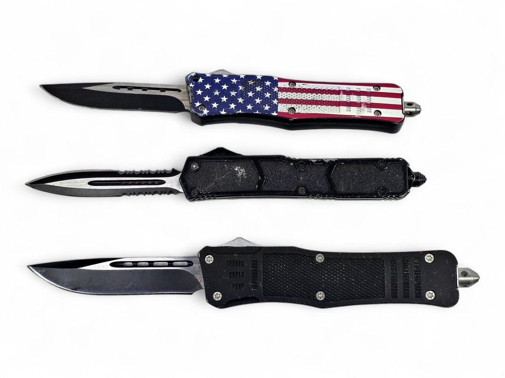 Three Out-the-Front Automatic Knives: Blades Grim, U.S. Flag & Dagger Styles