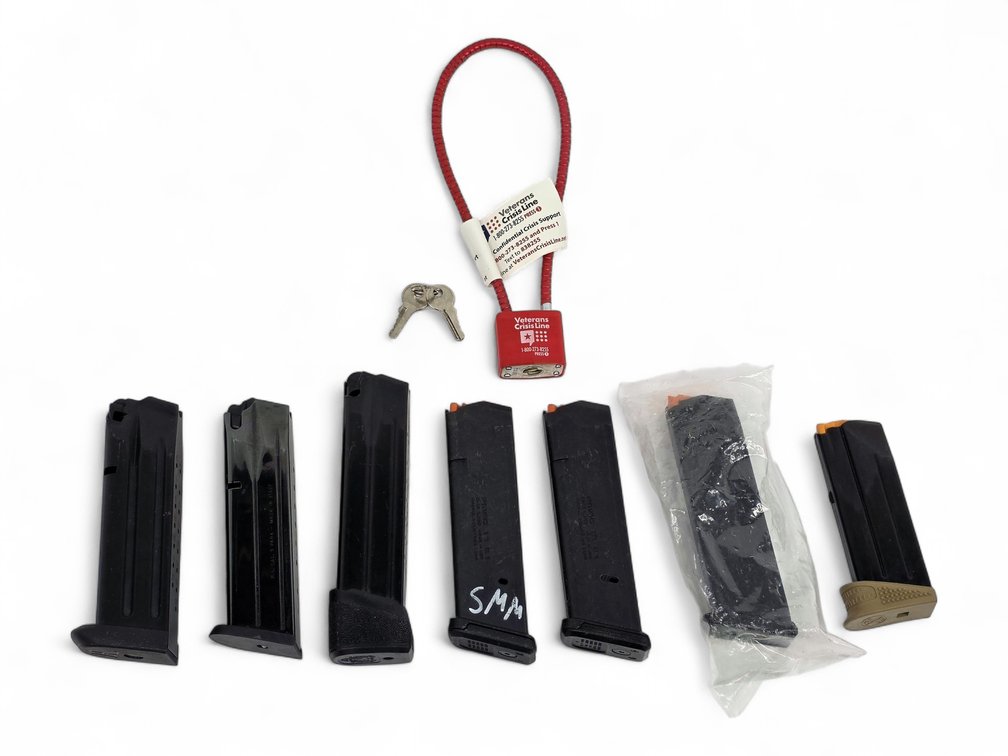 Seven Pistol Magazines with Glock, Magpul, FN & Other Marks, Plus Cable Lock