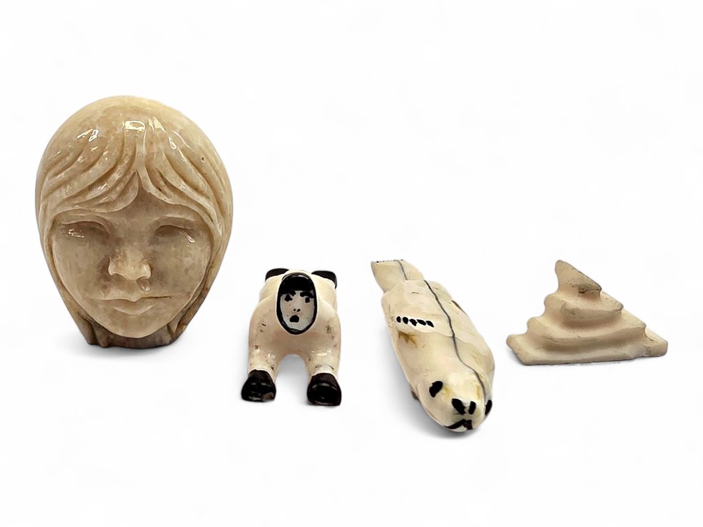 Four Miniature Ivory Carvings: Woman, Seal, Reclining Figure & Abstract Form