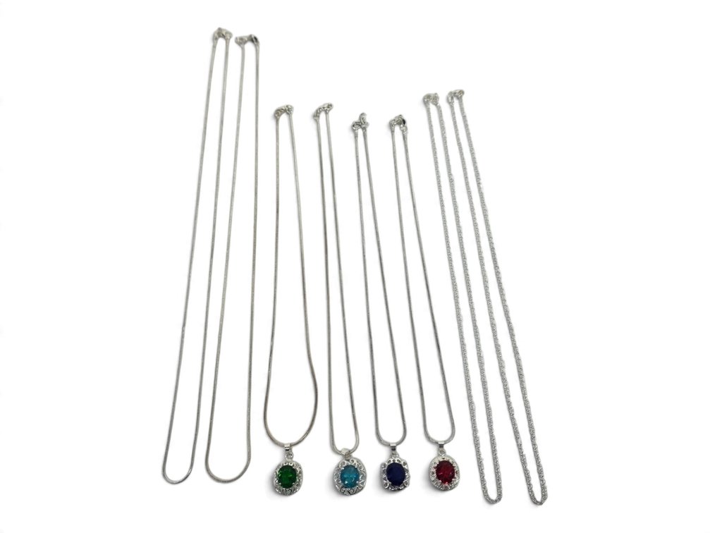 Eight Sterling Silver Chains & Four Pendants with Faceted Colored Stones