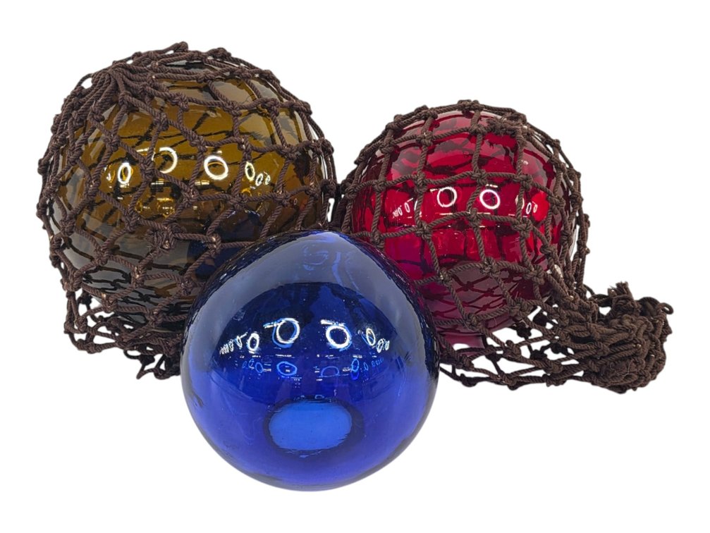 Three Colored Glass Fishing Floats, Two Netted Examples with Hokuyo Glass Labels