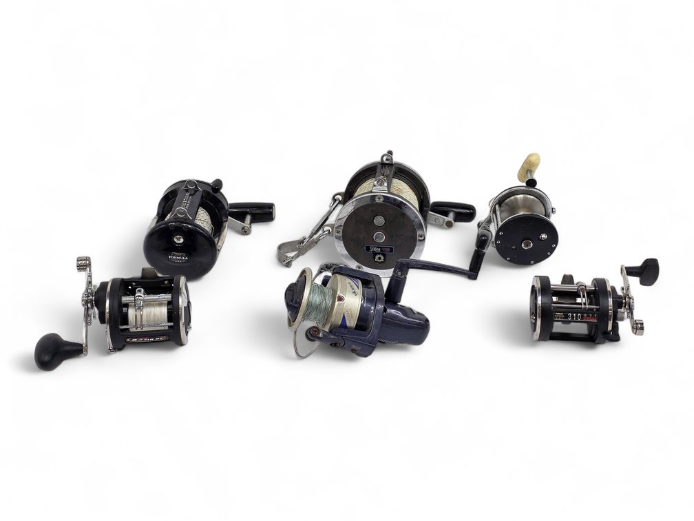 Six Fishing Reels: Daiwa Sealine 900H, Four Penn Models & Okuma Spinning Reel